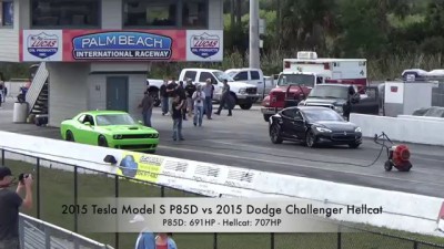 Tesla Model S P85D Sets 1/4 Mile World Record While Challenger Hellcat Goes up in Smoke Drag Racing