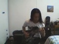 Китаец играет на гитаре