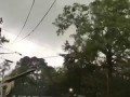 Tornado rips roof off house.