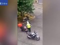 Shocking footage shows Pizza Hut delivery man and motorcyclist in vicious fight sparked by road rage