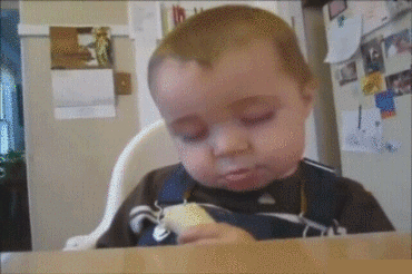 Sleepy child eats