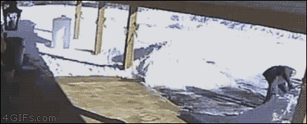 Snow-shoveling-roof-door-fail