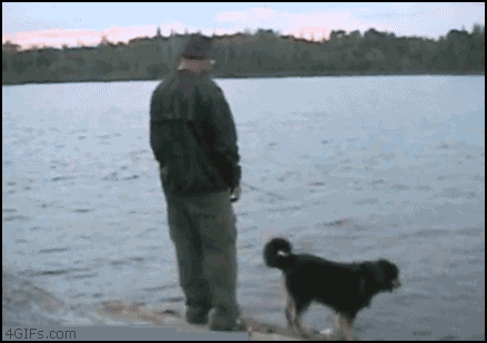 Fisherman_pushes_dog_lake