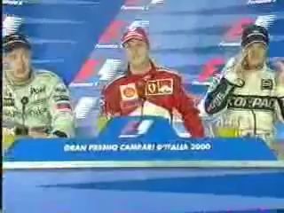 Michael Schumacher cries during 2000 Italian Grand Prix press conference