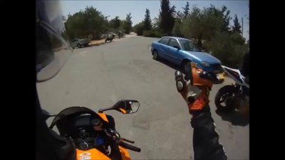 Motorcycle Near Miss With Cyclist