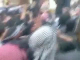 A Very Brutal Prolonged Public Hanging..Man is Dangling as he is Beaten by Crowd