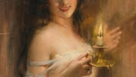 A young woman with a candle