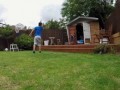 Kid Gets Hit with Soccer Ball and Falls into Shed