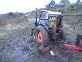 Как вытащить трактор из глубокой грязи