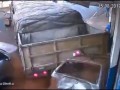 Truck reverses into shop in Brazil