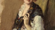 A young girl with a fan